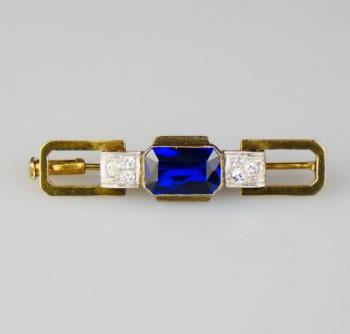 Art deco zlatá brož s diamanty a safírem Art deco zlatá brož s diamanty a safírem